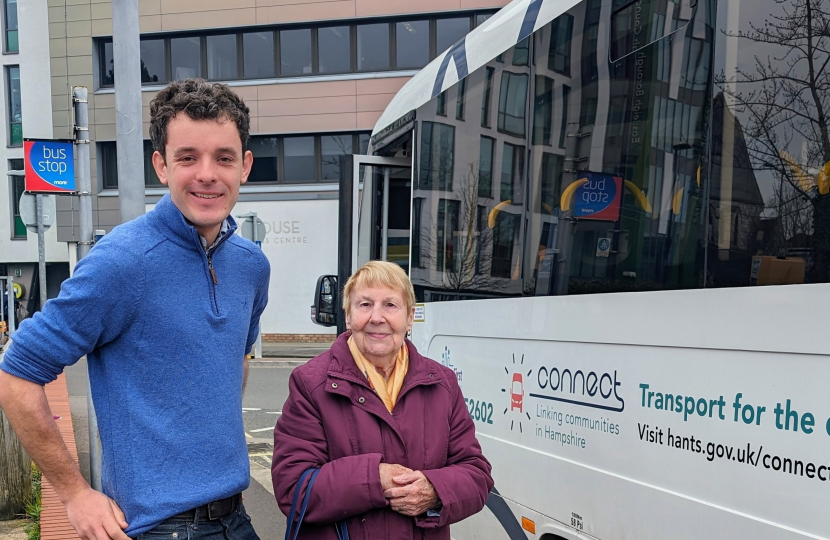 Sam disembarks from the #44 bus with a local resident