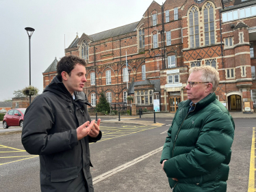 Sam discusses proposed A&E changes with a Hiltingbury resident